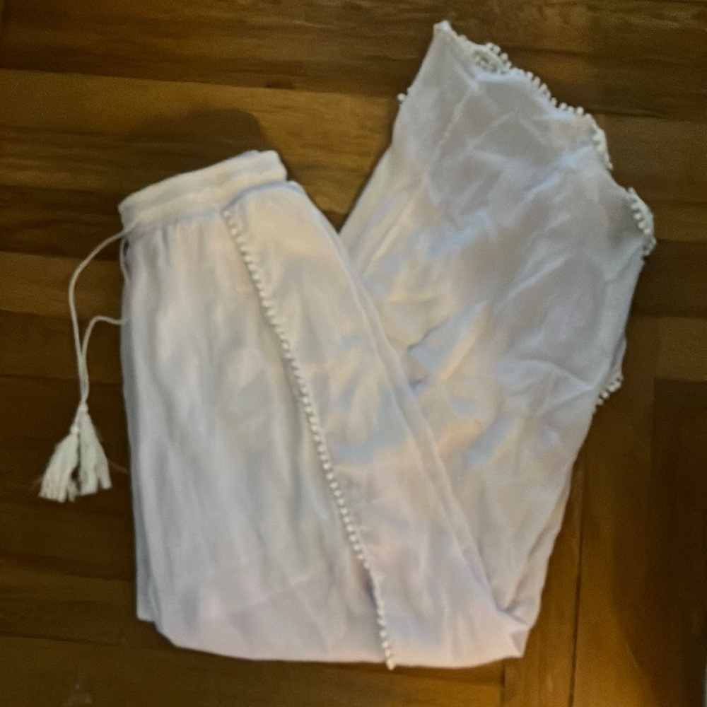 white flowy pants with shorts underneath.